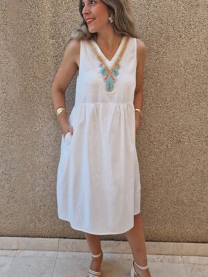 Vestido corto detalle pedreria cuello con bolsillos