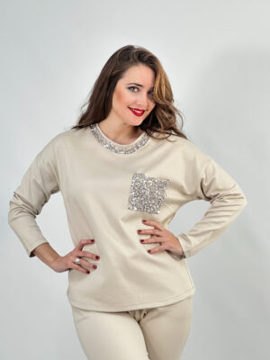 Conjunto jersey y pantalón jogger cuello y bolsillos lentejuelas beige