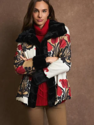 Abrigo reversible estampado floral rojo y camel y pelo negro