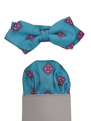 Pajarita turquesa flores cuadradas rosas