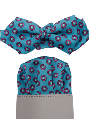 Pajarita turquesa círculos rosas