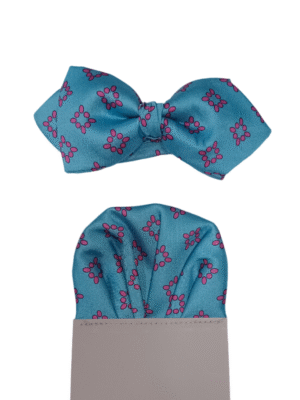 Pajarita turquesa cuadrados rosas