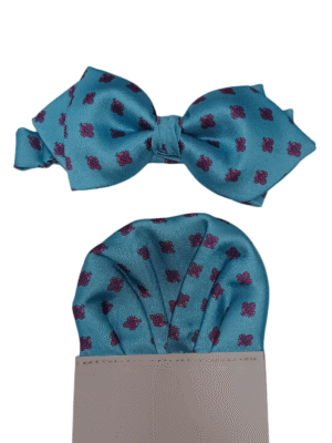 Pajarita turquesa picas rosas