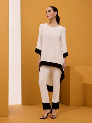 Conjunto blusón y pantalón blanco filos negros