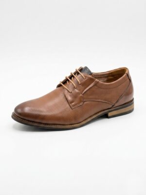 Zapato de vestir perforado